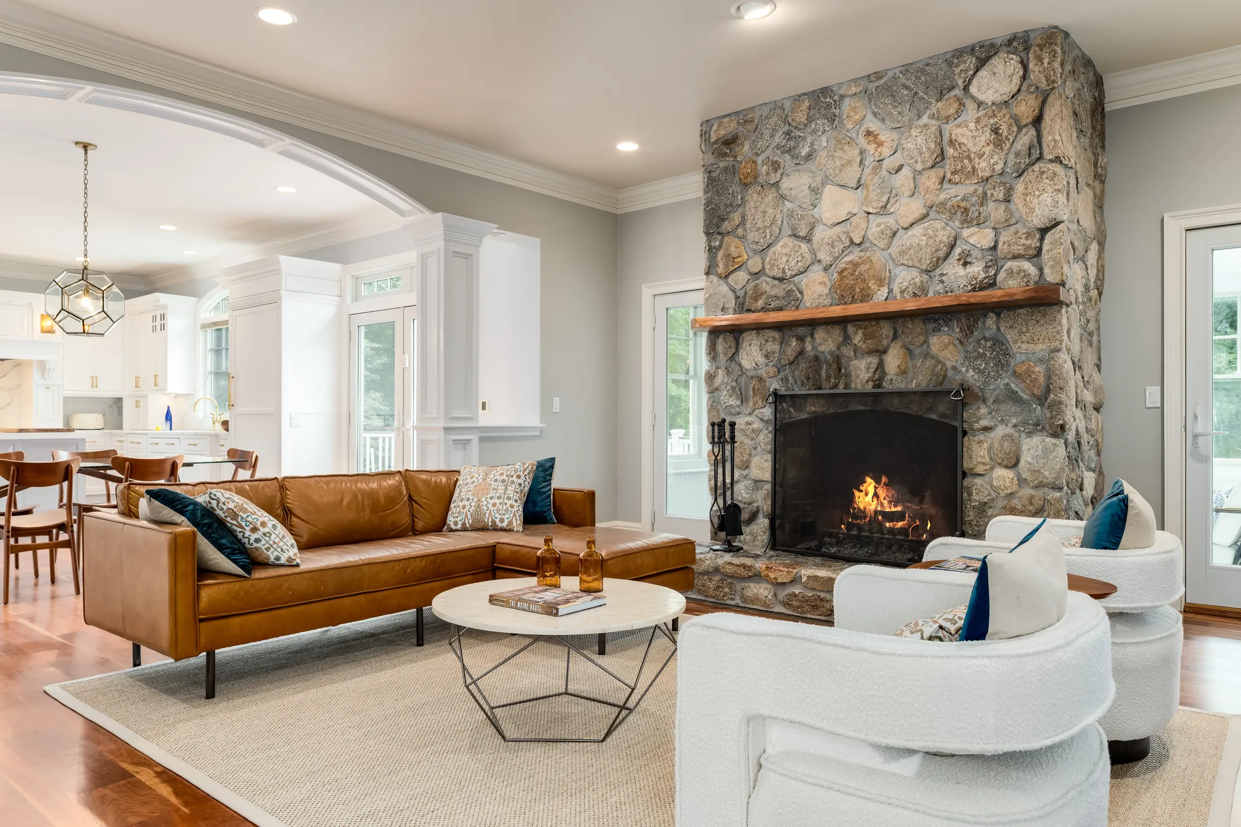 Stone fireplace and seating area at 246 East Middle Patent Road