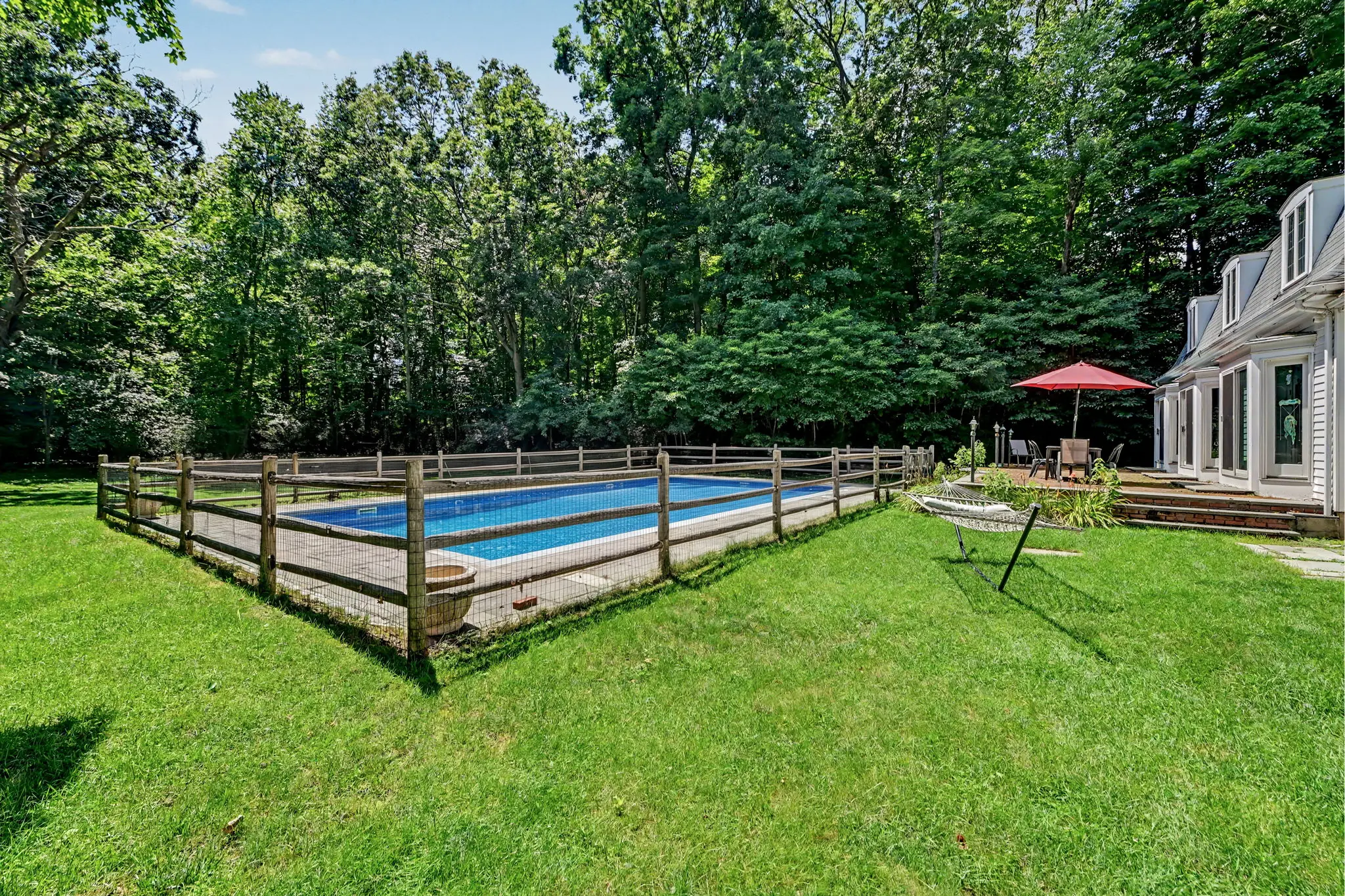 Pool and rear yard at 43 Alvin Drive