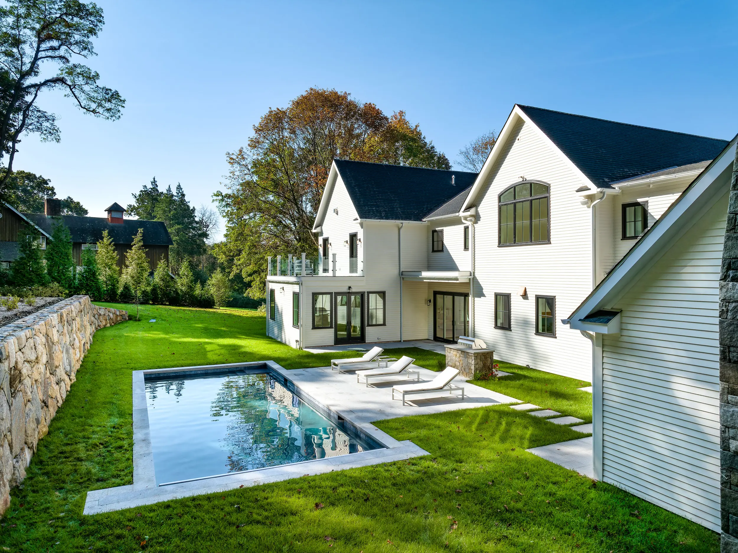 Pool and rear exterior at 460 Middlesex Road
