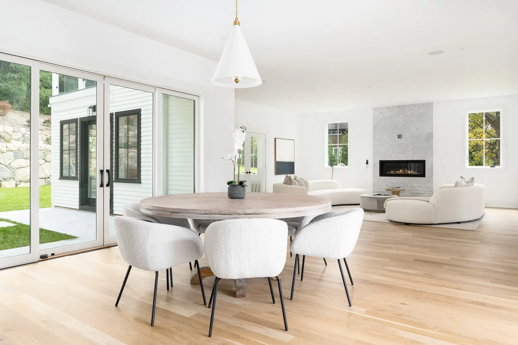 Dining area and living room with fireplace at 460 Middlesex Road
